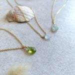 STUDIO NAIONA GENTLE HEART Kette, Aquamarin, oval, tiny, Peridot, gold, Titelbild
