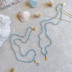 STUDIO NAIONA LOVING COMPASSION Mala, Aquamarin, Titelbild, Gold