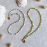 STUDIO NAIONA OCEAN HEART Kette, Titelbild, Aquamarin, Peridot & Süßwasserperle, gold